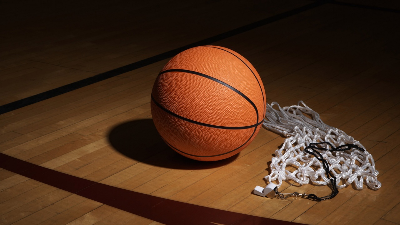 A Basketball Net And Whistle