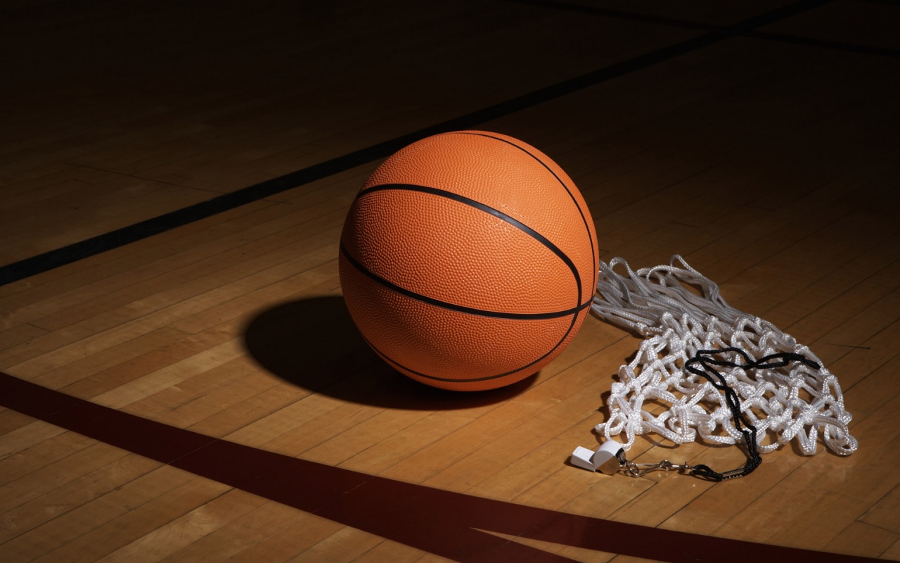 A Basketball Net And Whistle