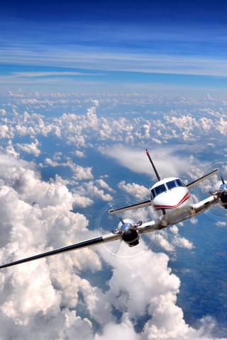 Airplane In The Clouds