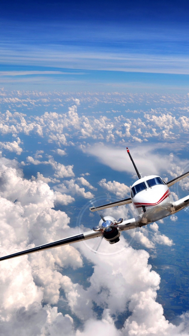 Airplane In The Clouds