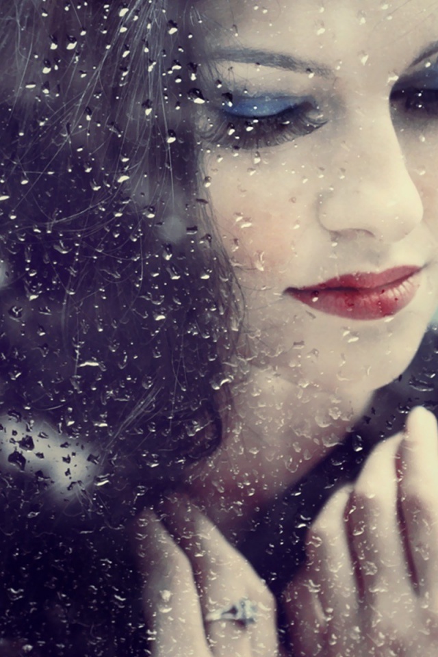 Beautiful Brunette Window Rain Drops Photo