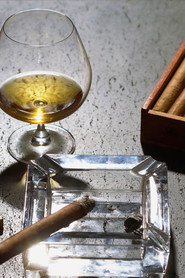 Close Up Of Cognac Glass And Cigars