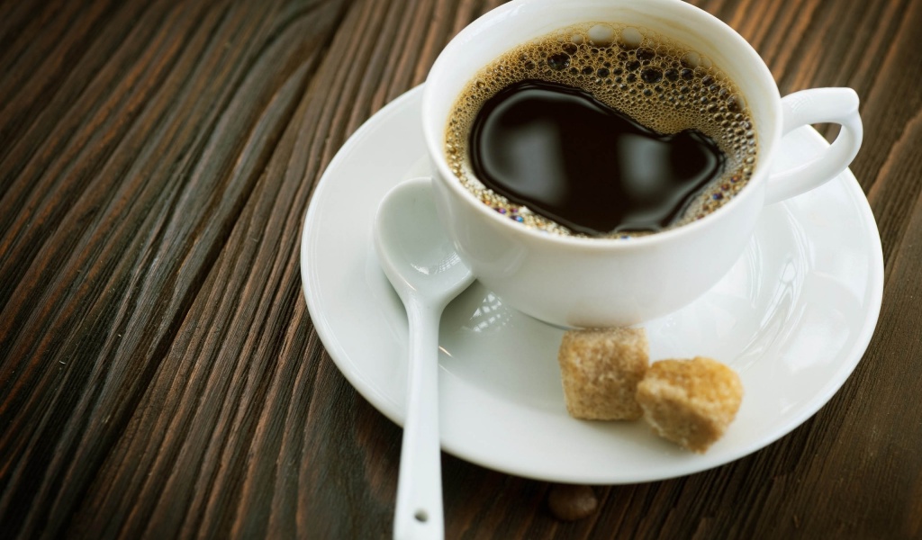 Cup Of Coffee And Sugar Cubes