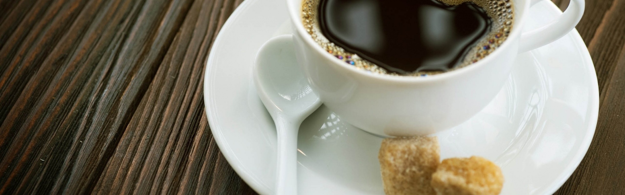 Cup Of Coffee And Sugar Cubes