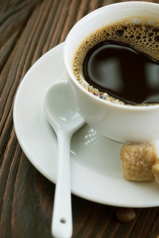 Cup Of Coffee And Sugar Cubes