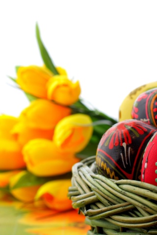 Easter Basket Of Eggs And Tulips