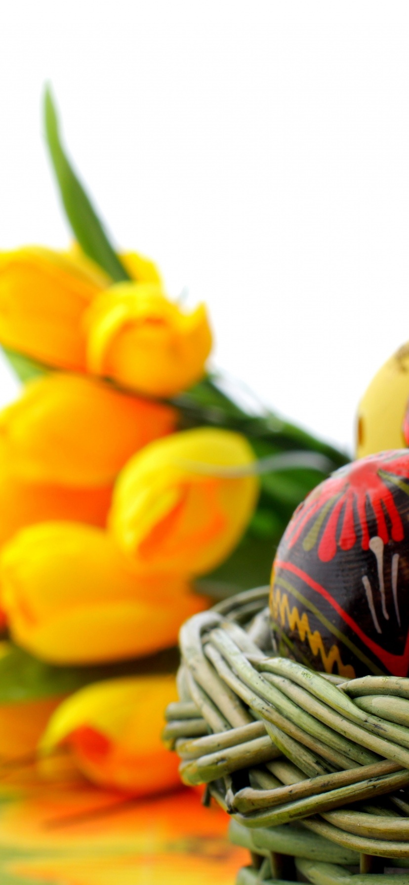 Easter Basket Of Eggs And Tulips