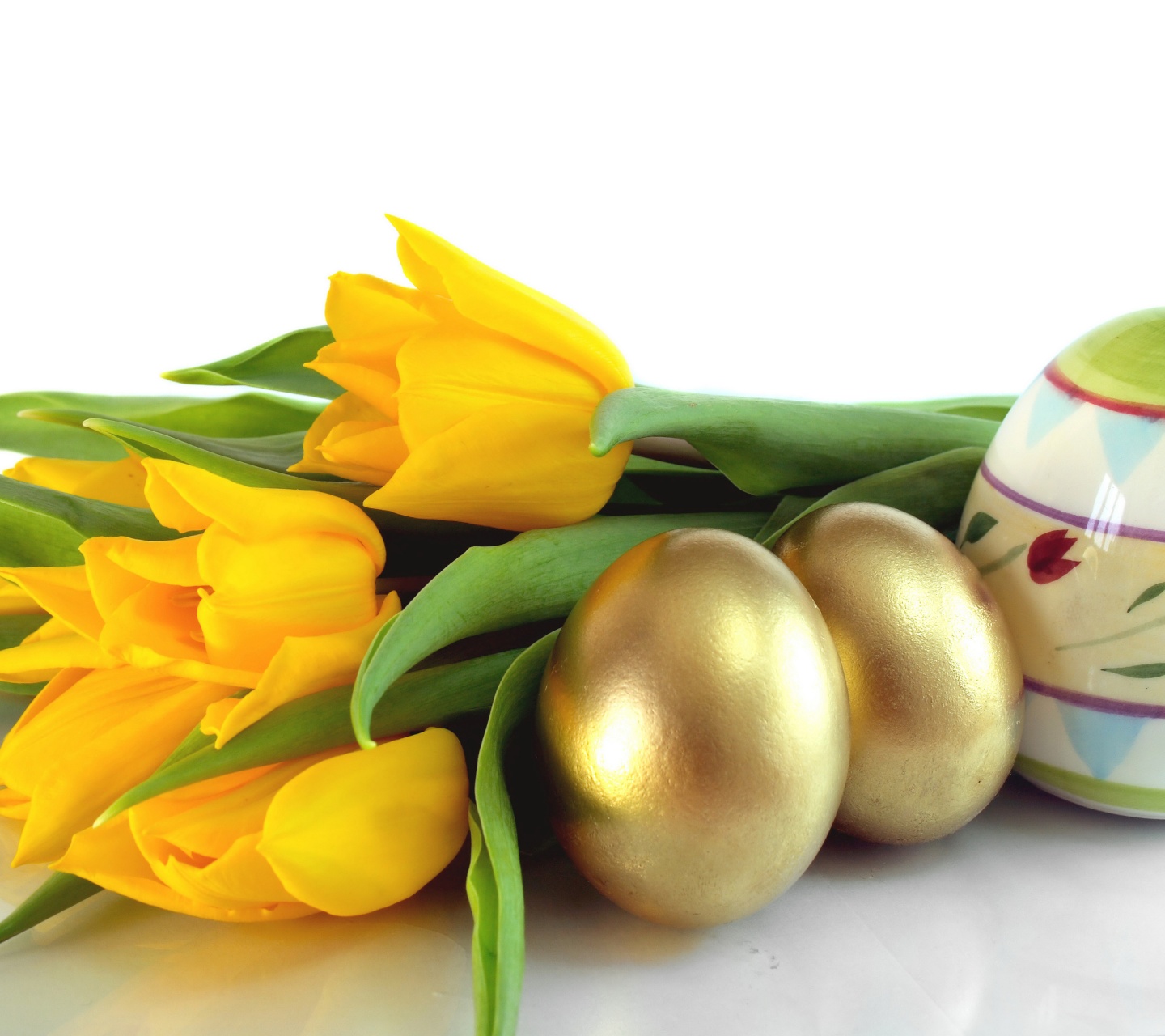 Easter Eggs And Yellow Tulips