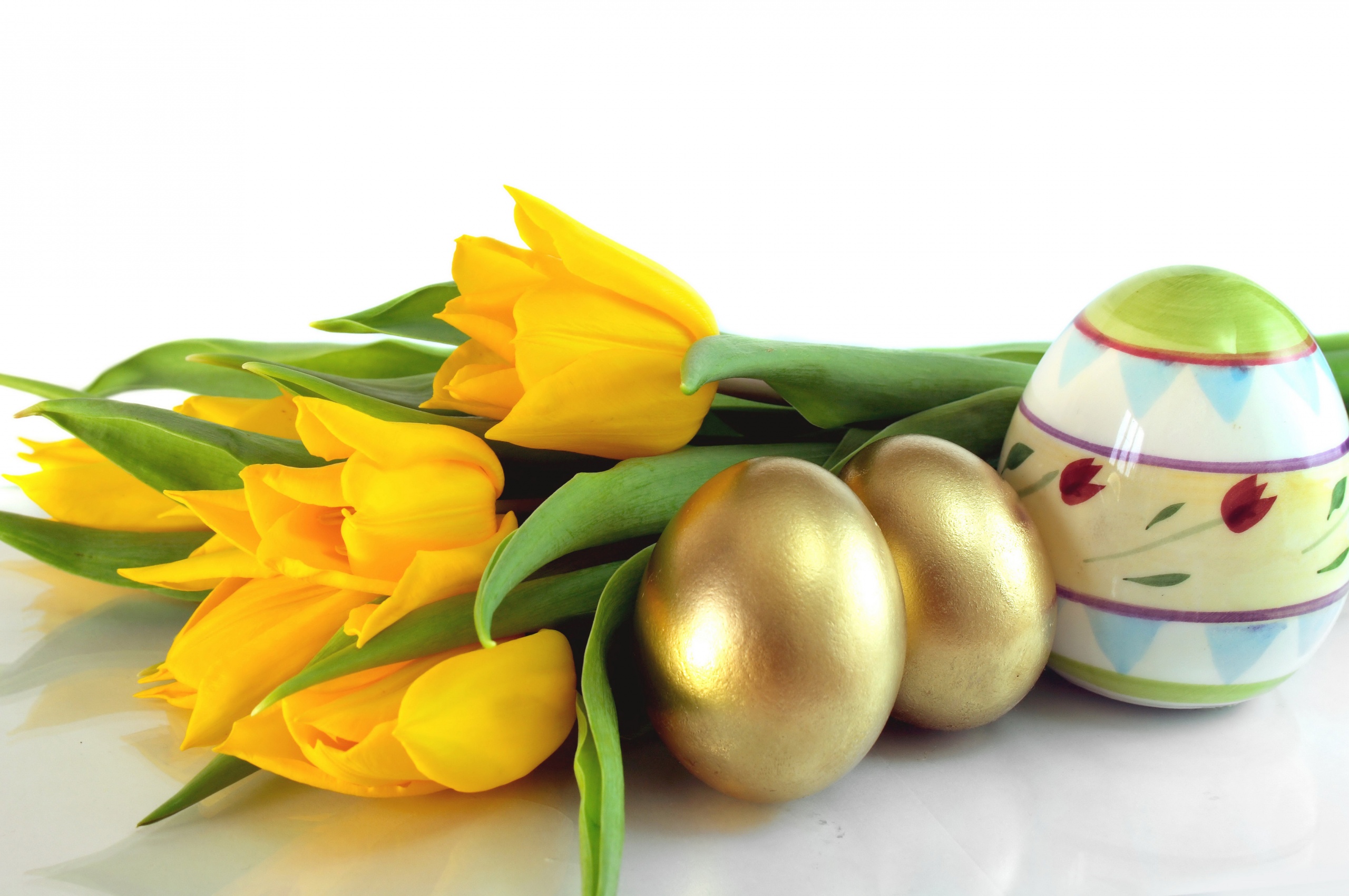 Easter Eggs And Yellow Tulips