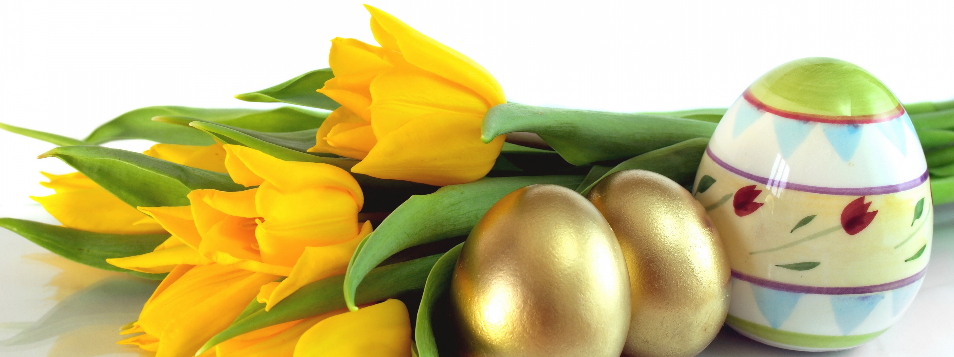 Easter Eggs And Yellow Tulips