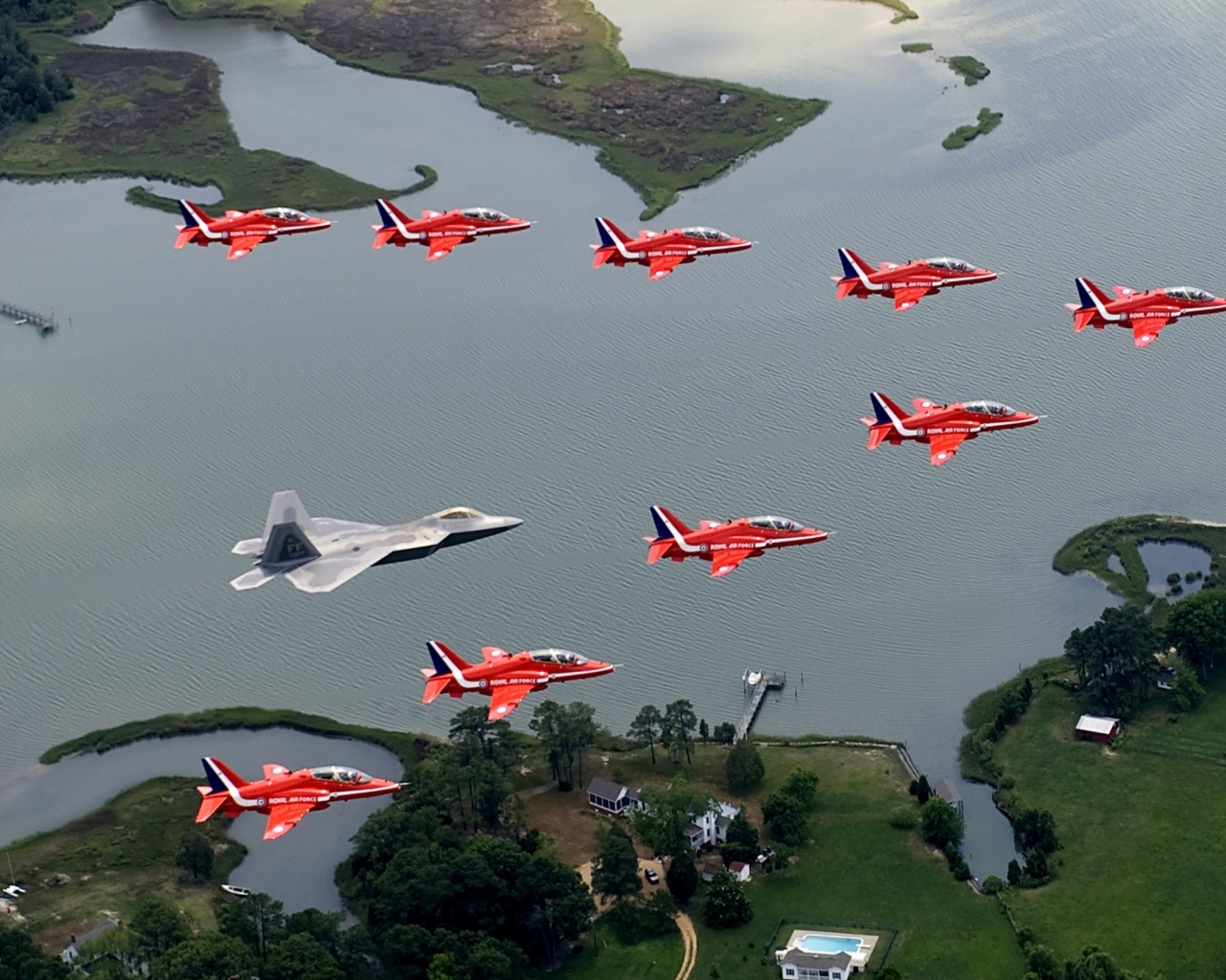 F22 And Red Arrows