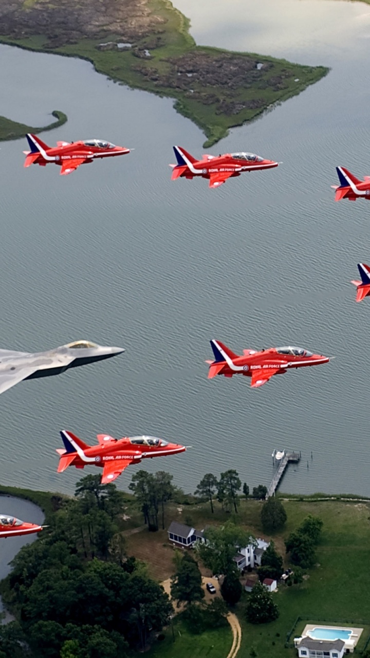 F22 And Red Arrows