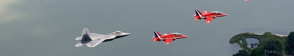 F22 And Red Arrows