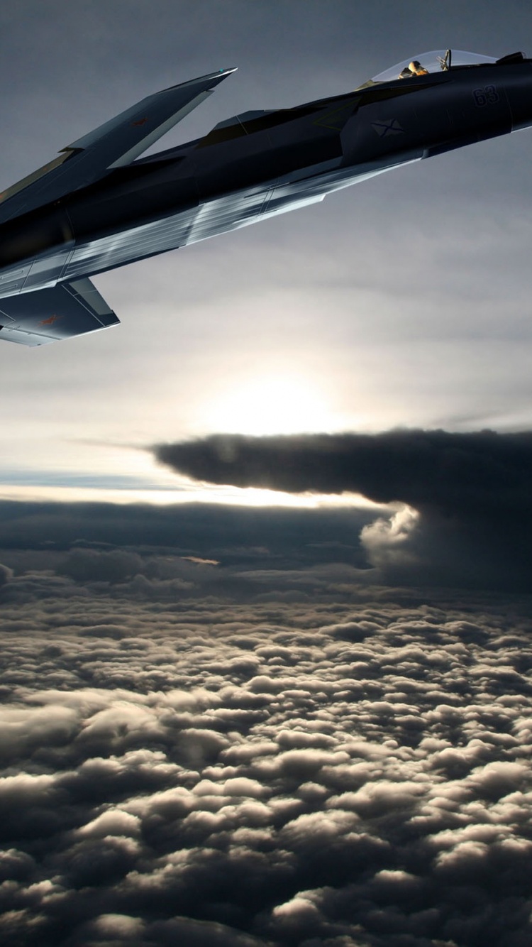 Fighter Aircraft Flying Out Of The Clouds