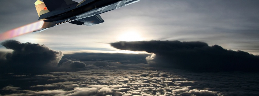 Fighter Aircraft Flying Out Of The Clouds