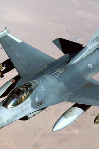 Fighter Jets Flying Over The Plains