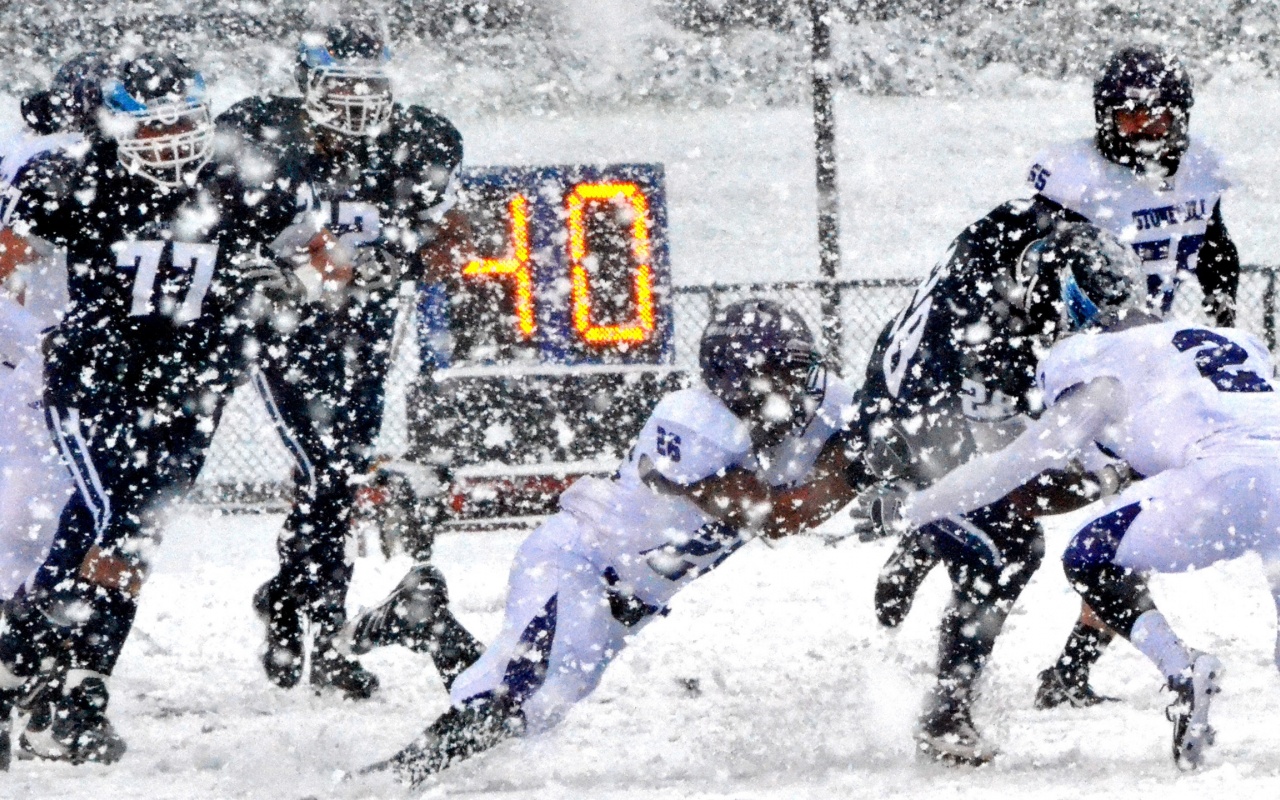 Football Match on a Snowy Blizzard