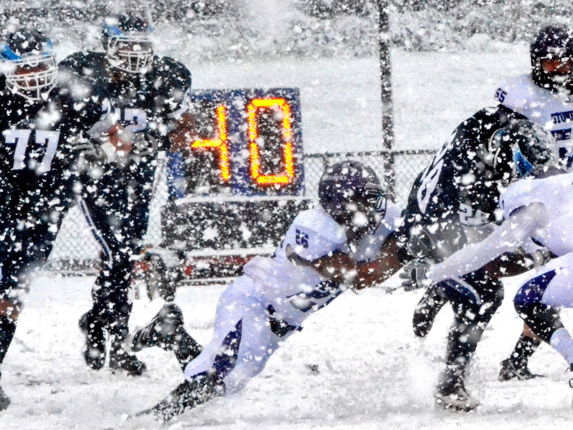 Football Match on a Snowy Blizzard