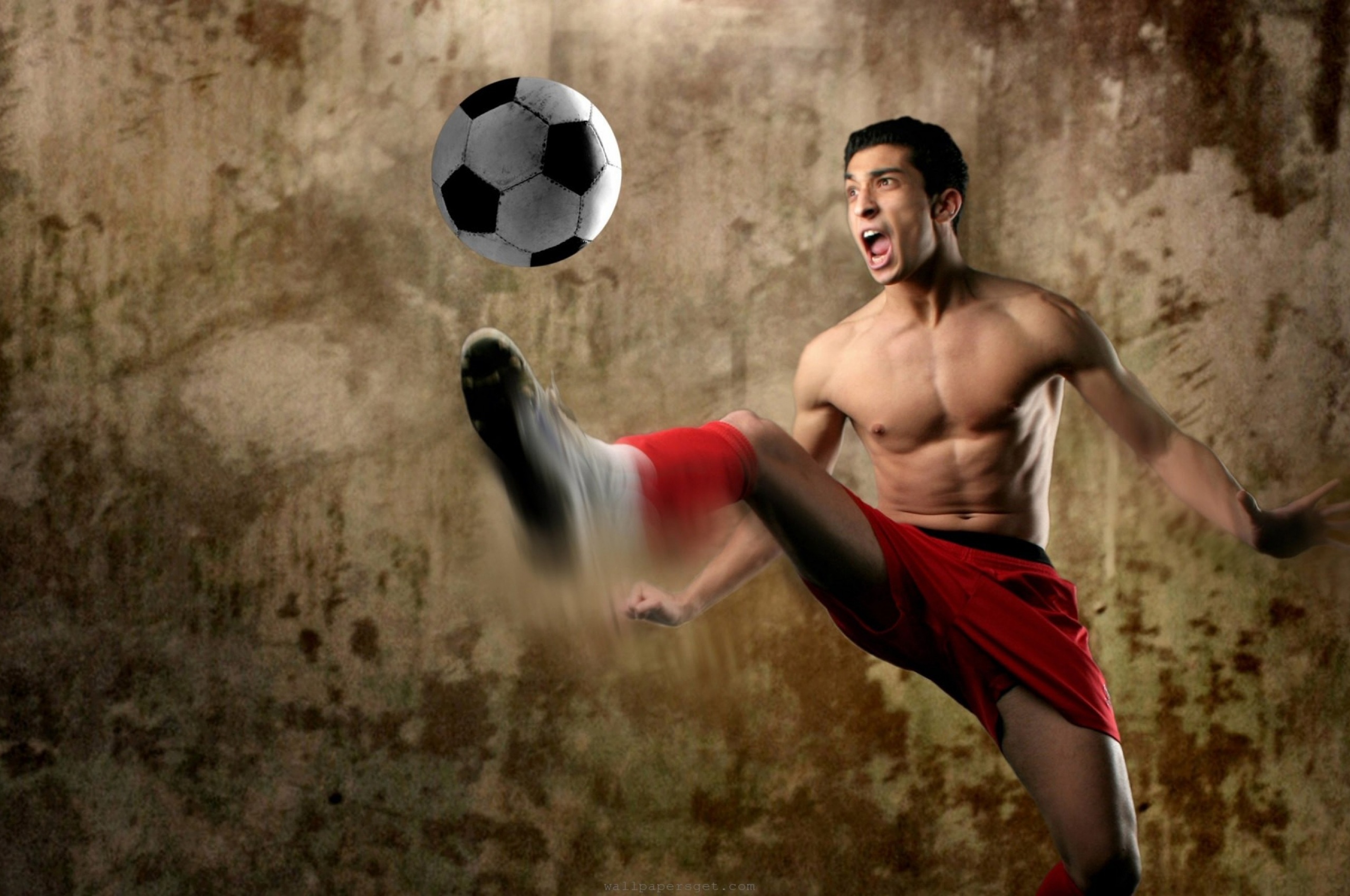 Footballer Kick A Ball