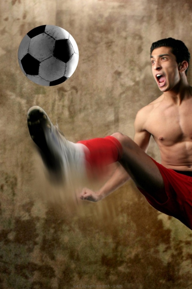 Footballer Kick A Ball