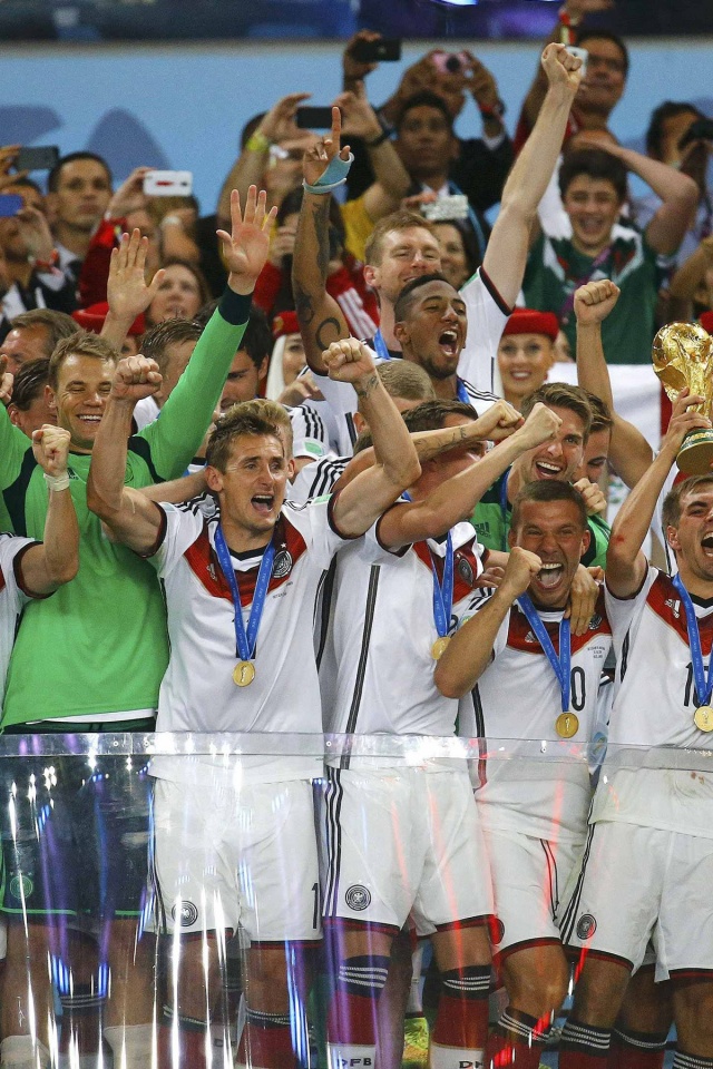 German Players Celebrate Title Of WC