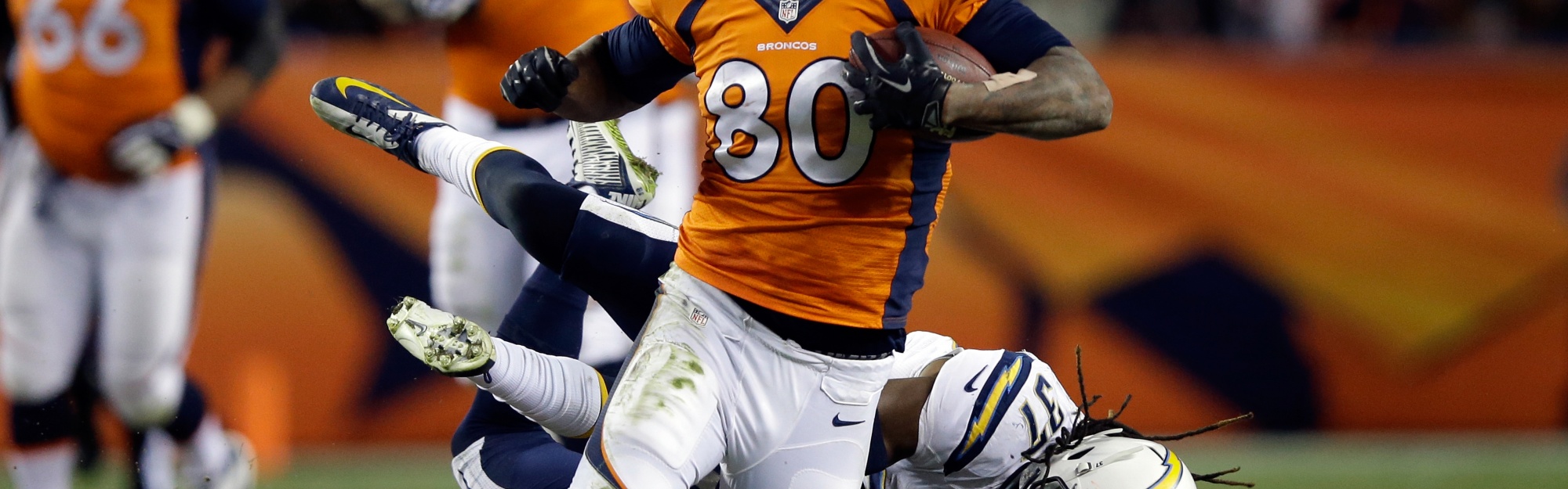 Julius Thomas Is Tackled By Addae