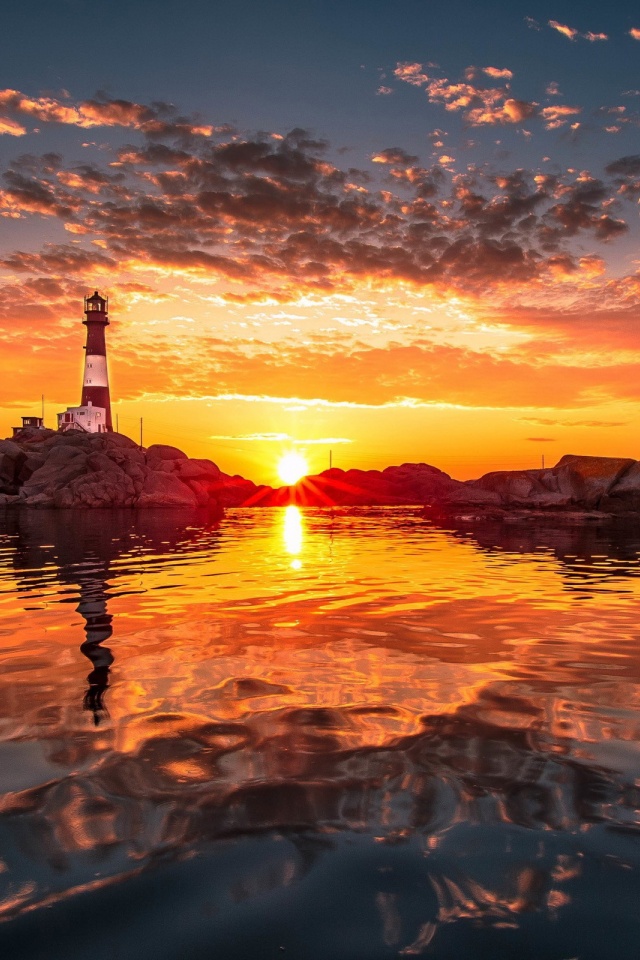 Lighthouse And Sunset