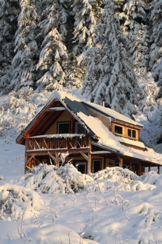 Mountain House Covered With Snow