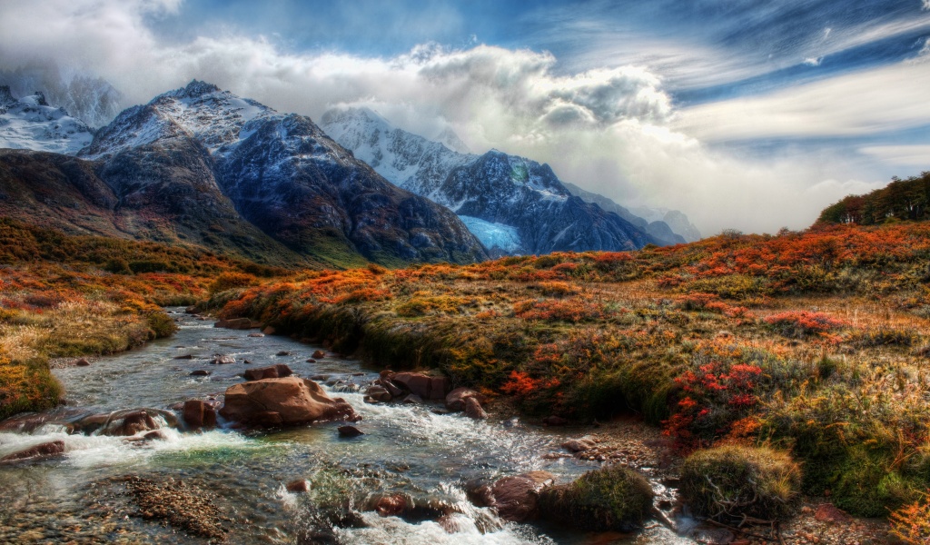 Mountain Peaks In Clouds