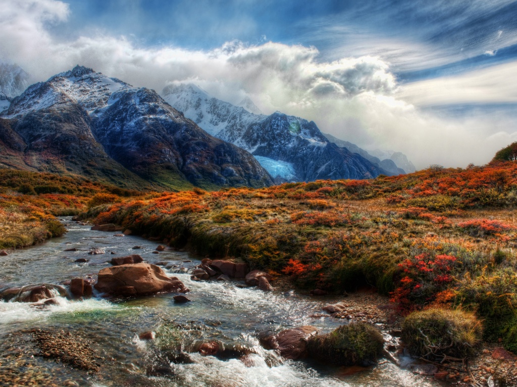 Mountain Peaks In Clouds