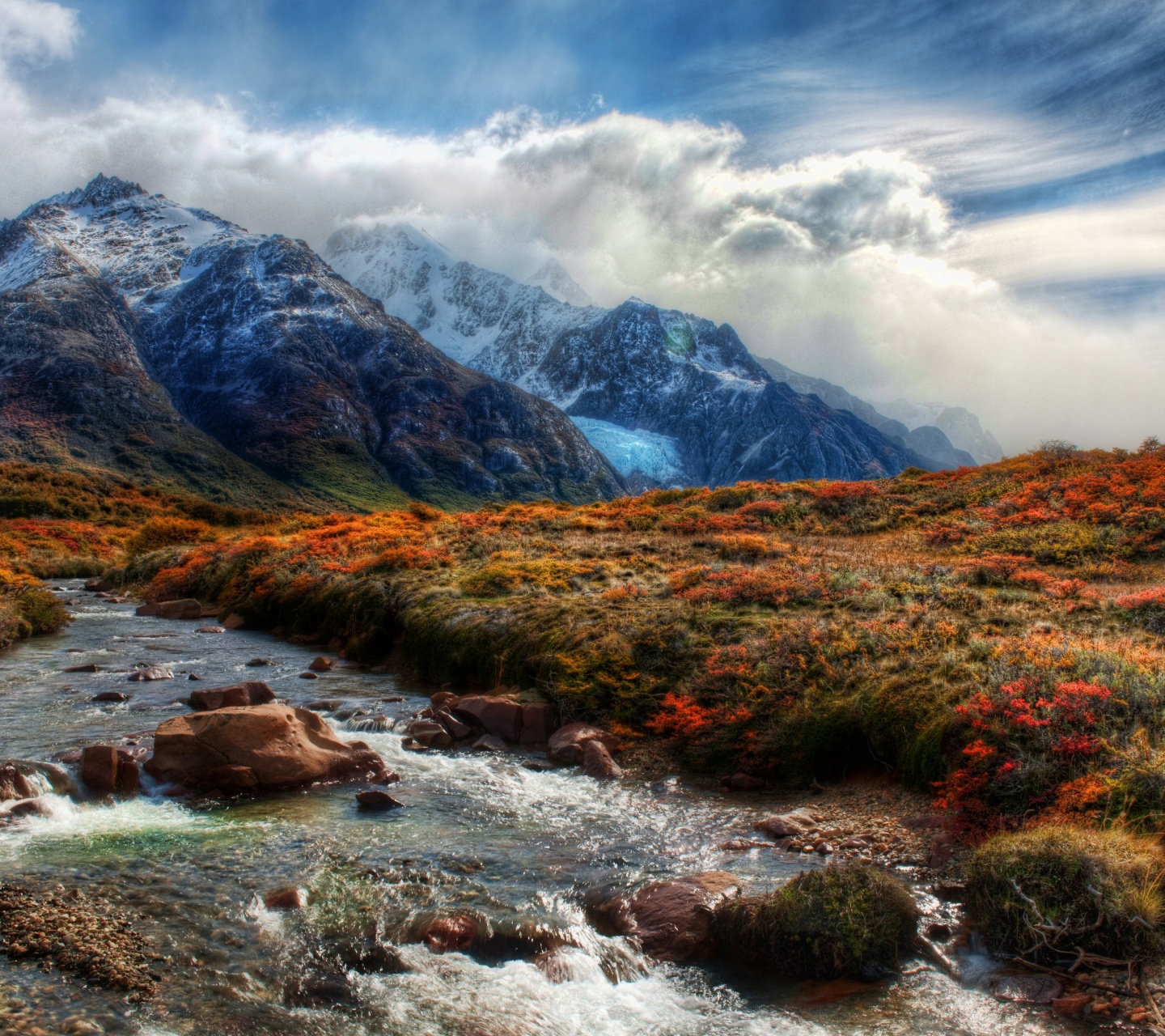 Mountain Peaks In Clouds