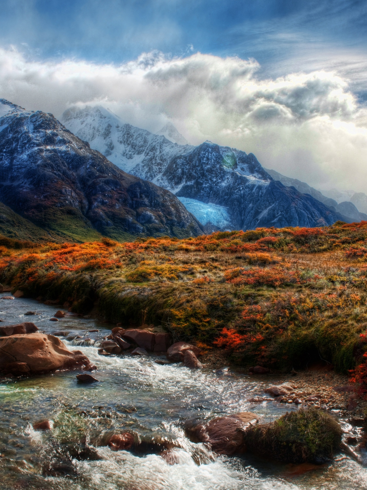 Mountain Peaks In Clouds