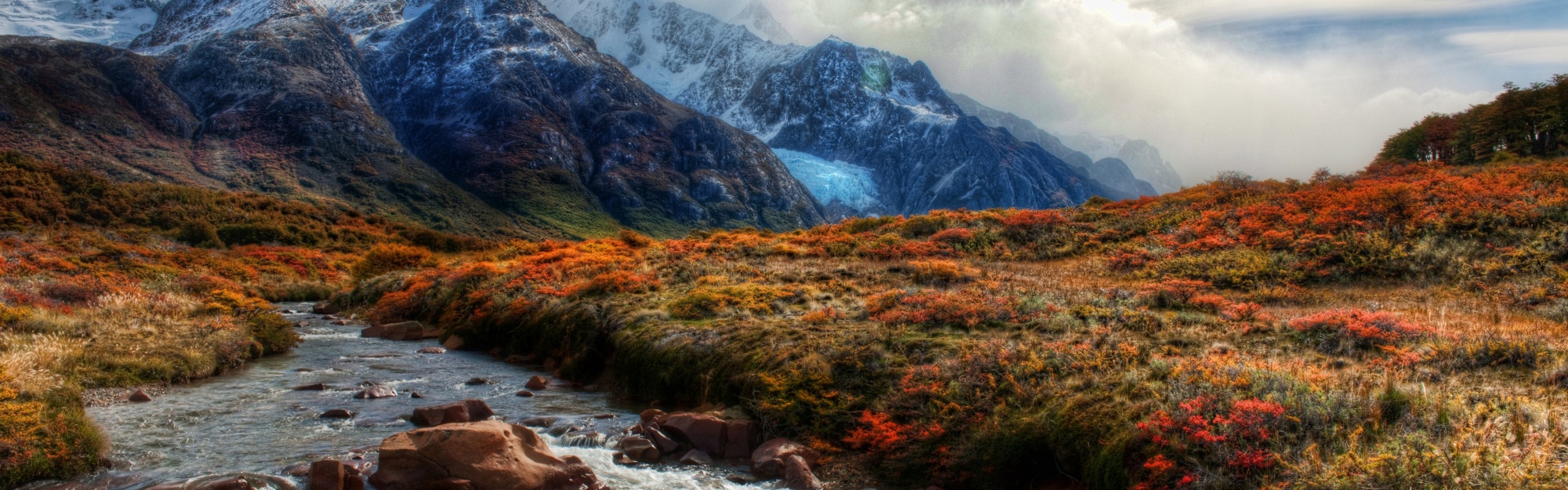 Mountain Peaks In Clouds