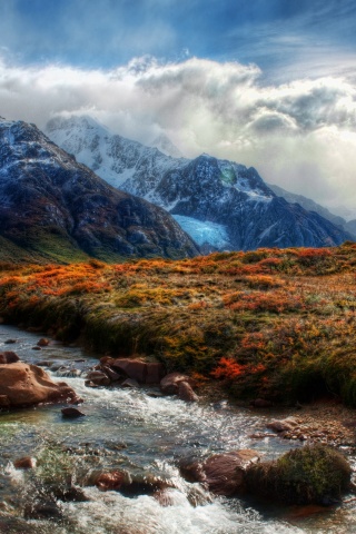 Mountain Peaks In Clouds