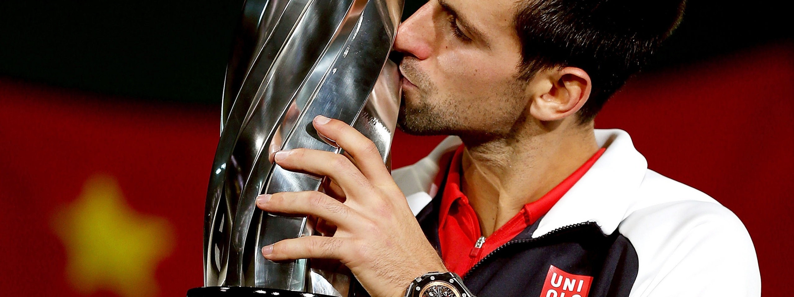 Novak Djokovic Kisses The Trophy