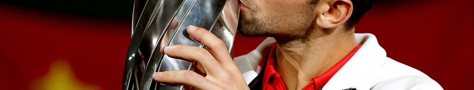 Novak Djokovic Kisses The Trophy