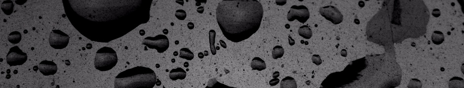 Puddled Water On Speckled Surface Texture