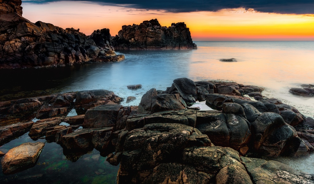 Sunset At A Rocky Coast