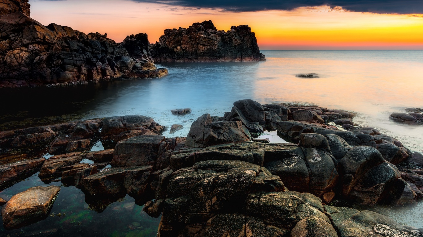 Sunset At A Rocky Coast