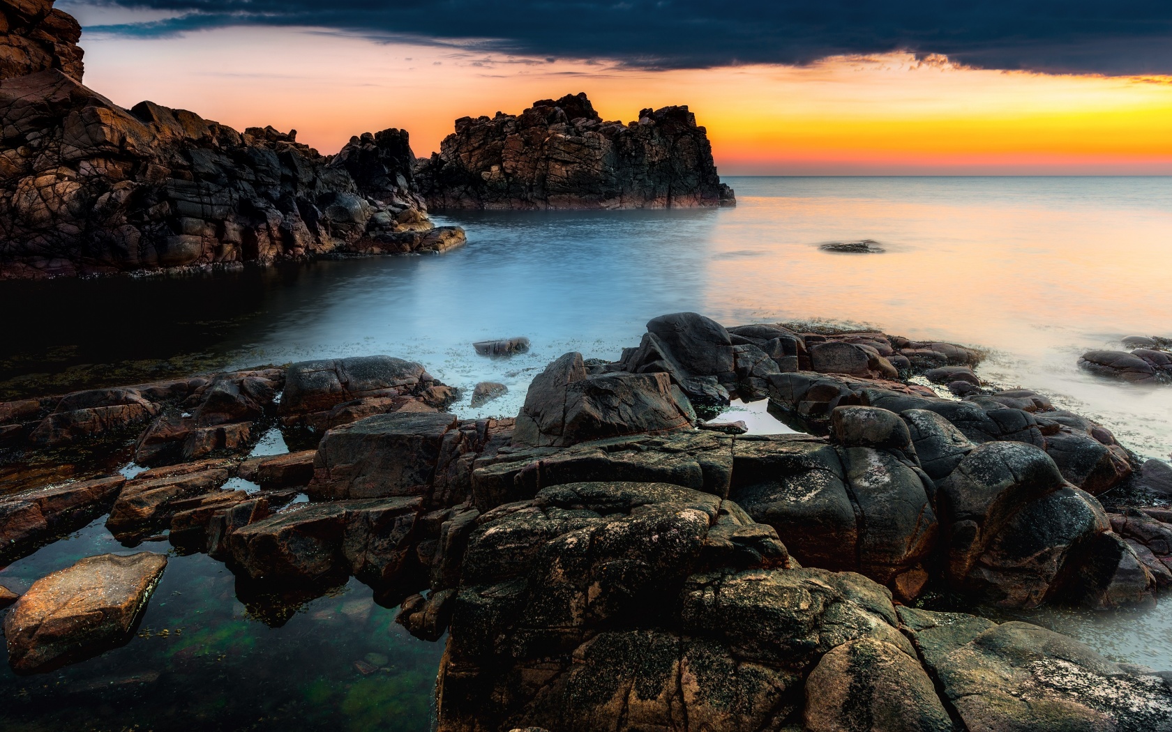 Sunset At A Rocky Coast