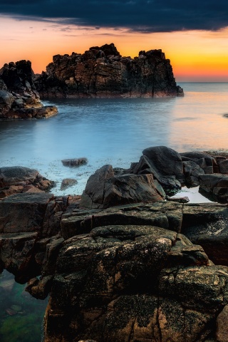 Sunset At A Rocky Coast