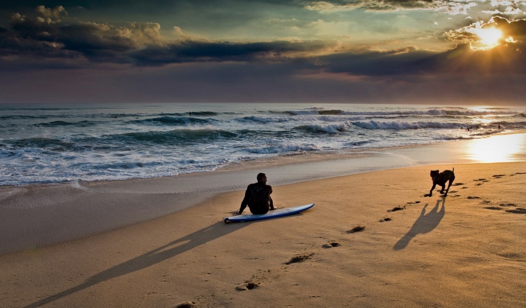 Sunset On The Beach And Surf