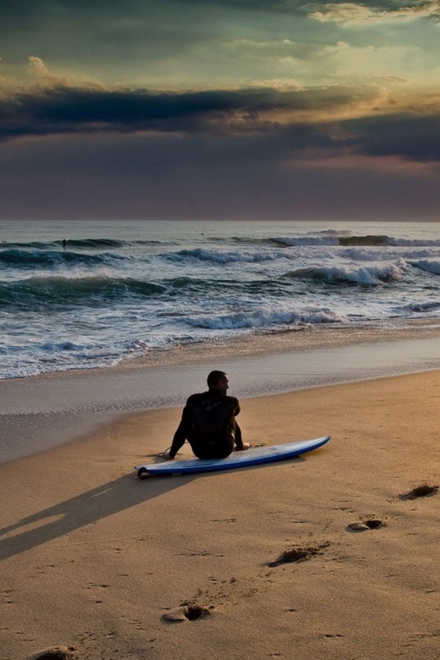 Sunset On The Beach And Surf