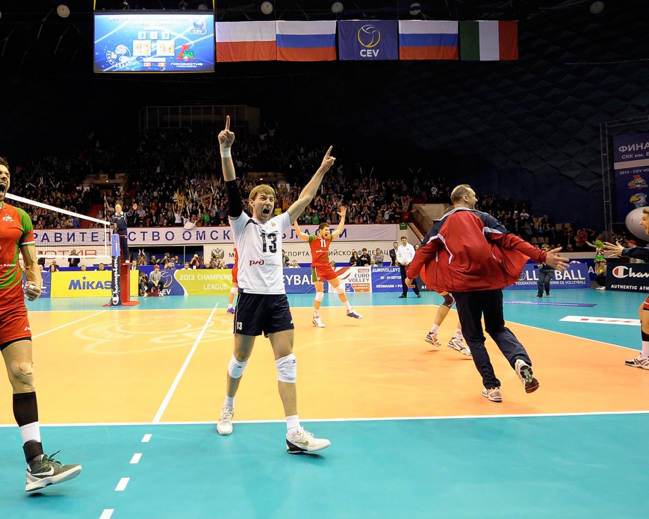 Volleyball Players Celebrate Victory