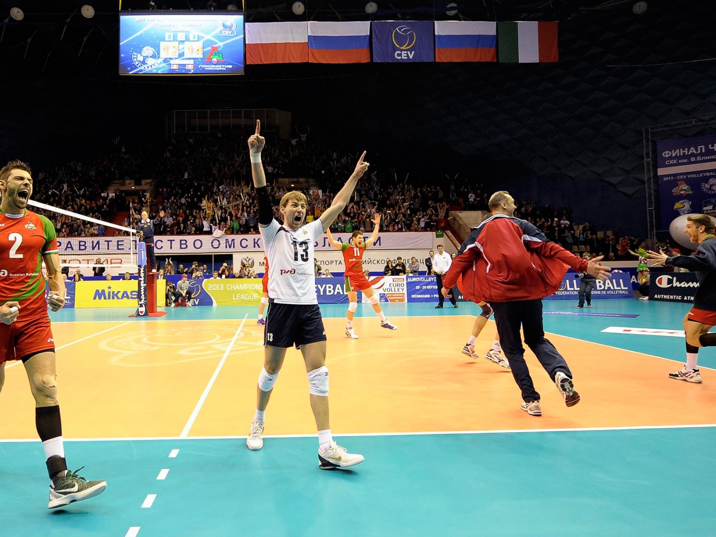 Volleyball Players Celebrate Victory