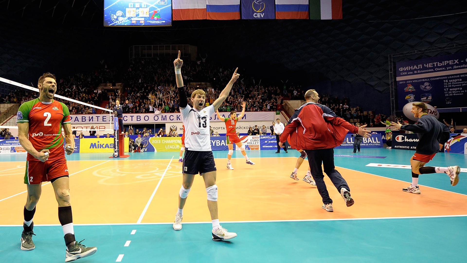 Volleyball Players Celebrate Victory