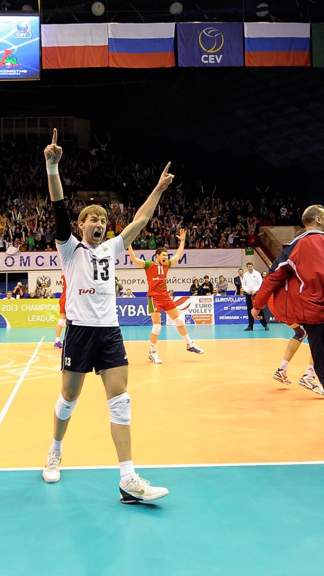 Volleyball Players Celebrate Victory