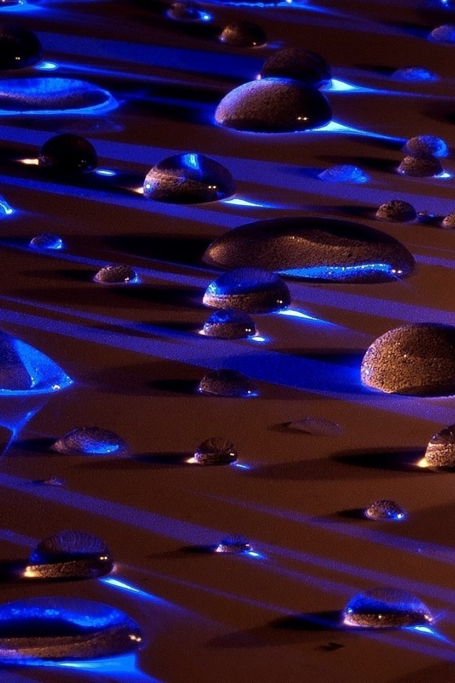 Water Drops In Blue Light