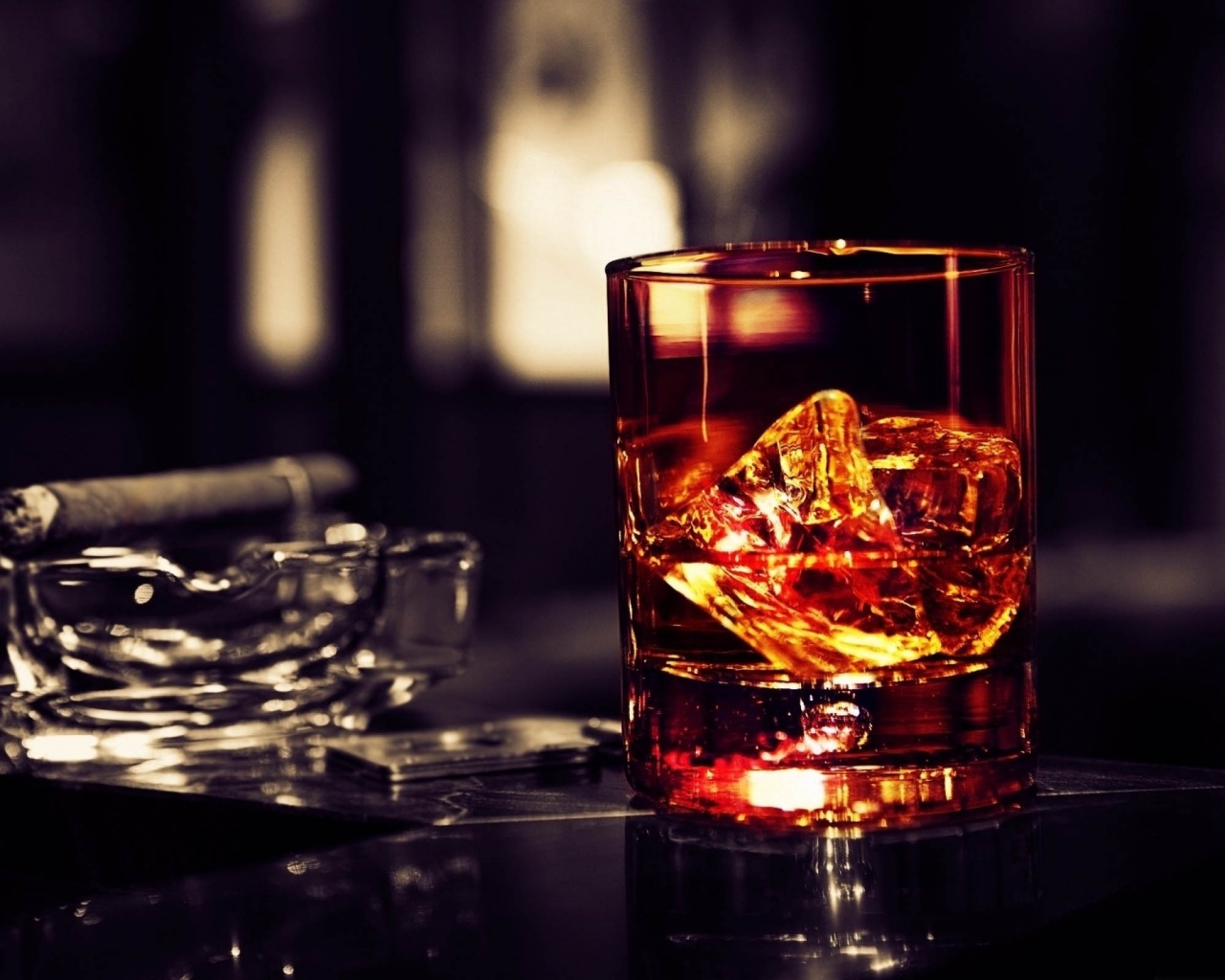 Whisky Glass With Cigar On The Table